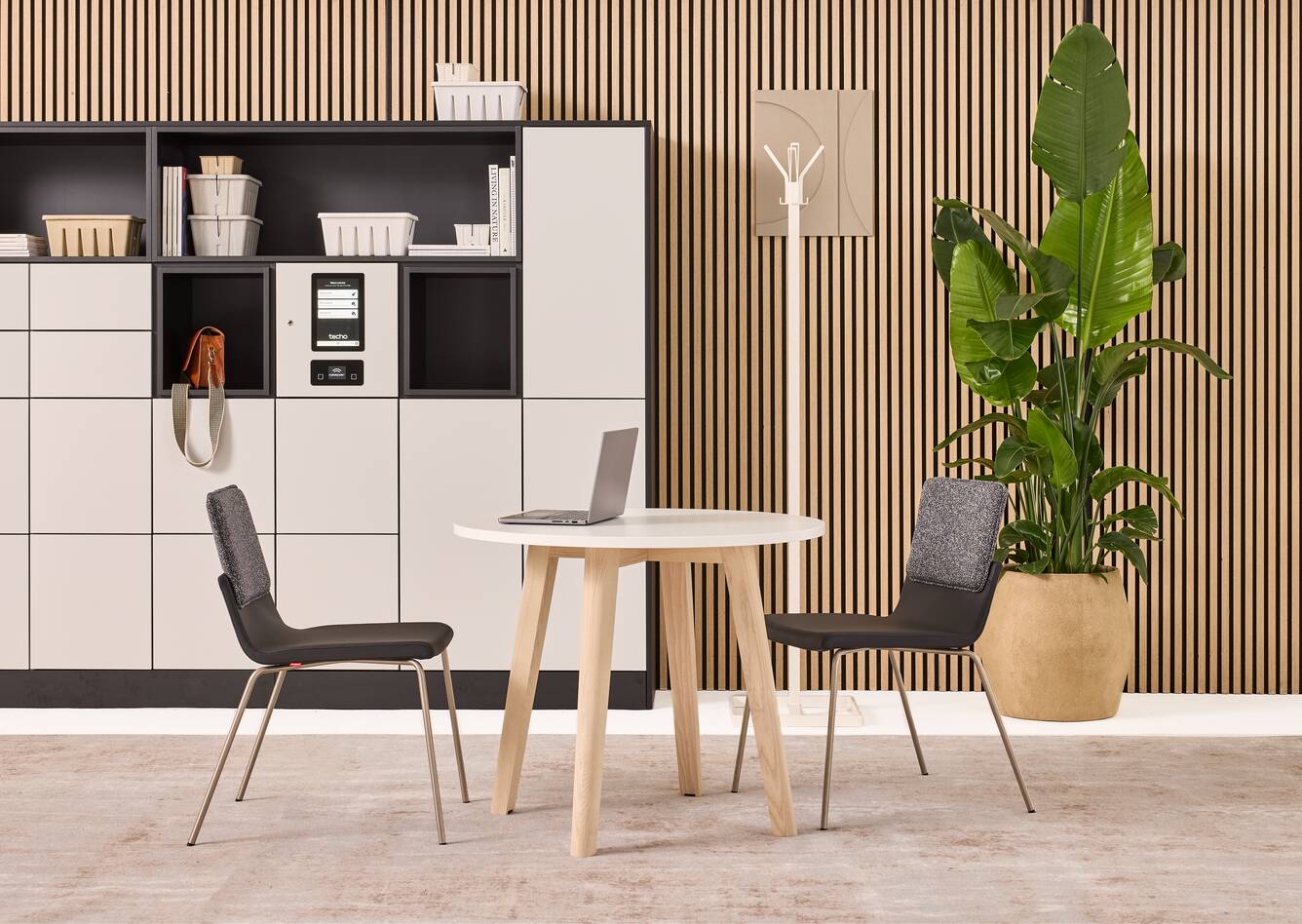 Hyll Smart Locker, Fount, Alva, Triennial Classic Techo Hyll Smart locker in grey with Fount table with Triennial Classic chair upholsterd in black and white Alva coatstand styled front view
