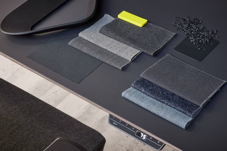 Ahrend Remode materials in black with fabrics and plastic granulates landscape top view