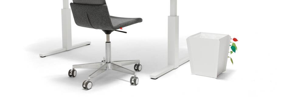 Gispen SteelTop T legged table with pure white RAL 9010 frame and tabletop and Triennial Work office chair with white Binit wastebin and Thunderball pendant lamp and leaves front right view