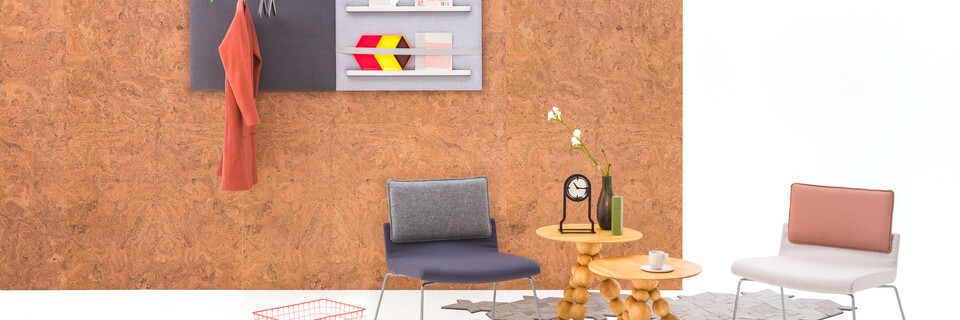 Gispen Triennial Relax chairs with Bor sidetables and Outline Clock in front of cork backpanel front view