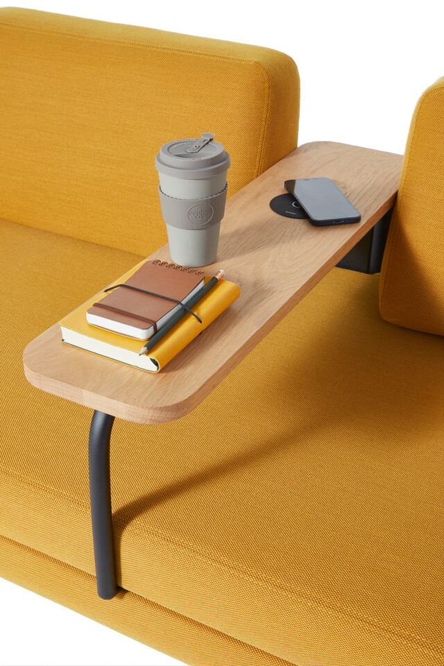 Gispen STEE sofa in black upholstered in yellow with oak table and PuK and styling front right detail view