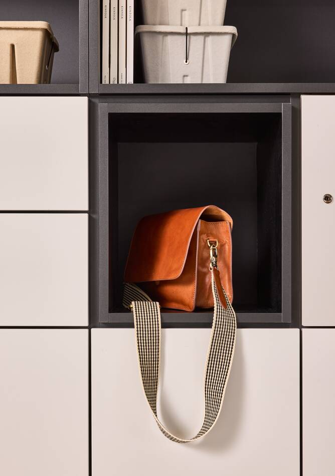 Hyll Smart Locker Techo Hyll Smart Locker with grey doors and handbag in open compartment front detail view
