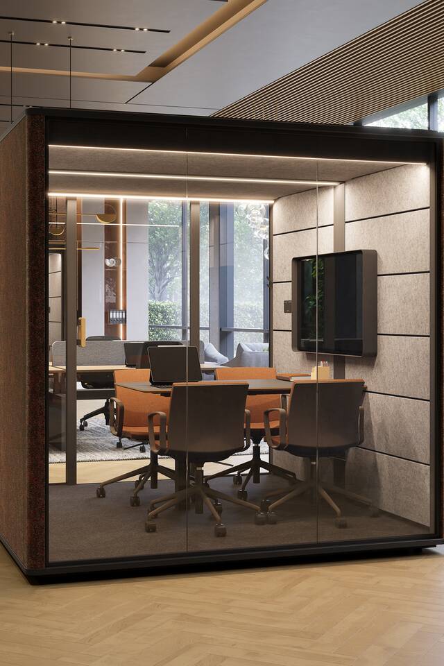 Royal Ahrend Cerene Chat Connect low office pod with brown upholstered sides with grey Well chairs with orange upholstery in office space wide