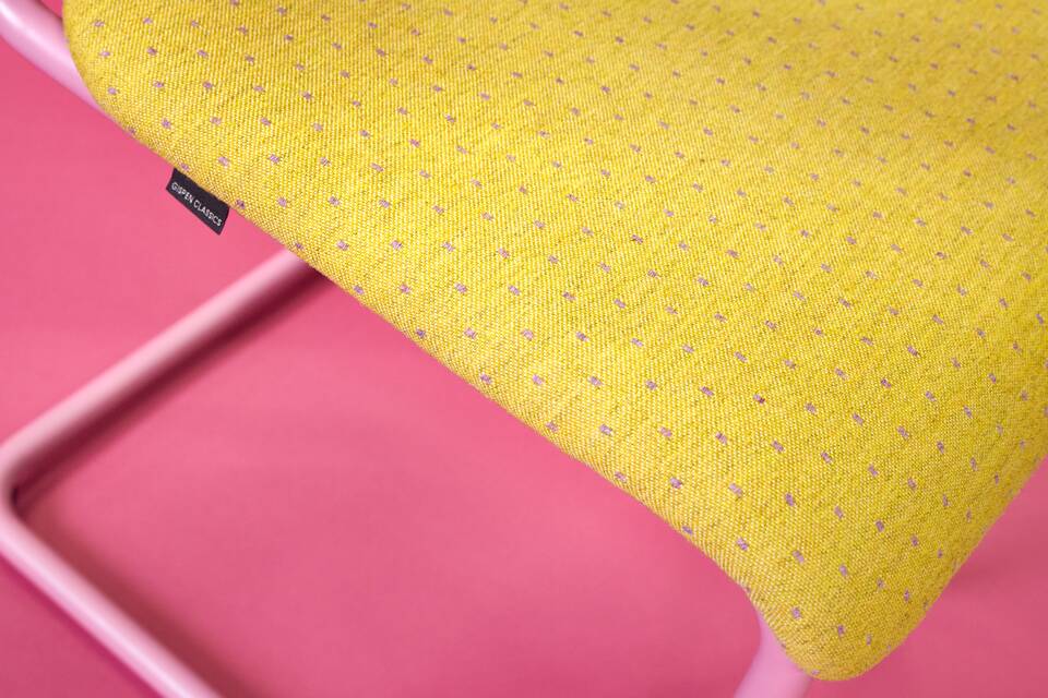 Gispen Classics 201 chair in light purple with yellow limited edition upholstered seat and back front left detail view