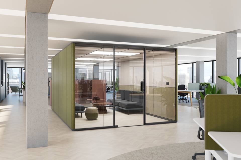 Royal Ahrend Zoniq office pod in anthracie and upholstered in orange with blue Embrace sofa and green Recharge 45 pouf in office setting interior view