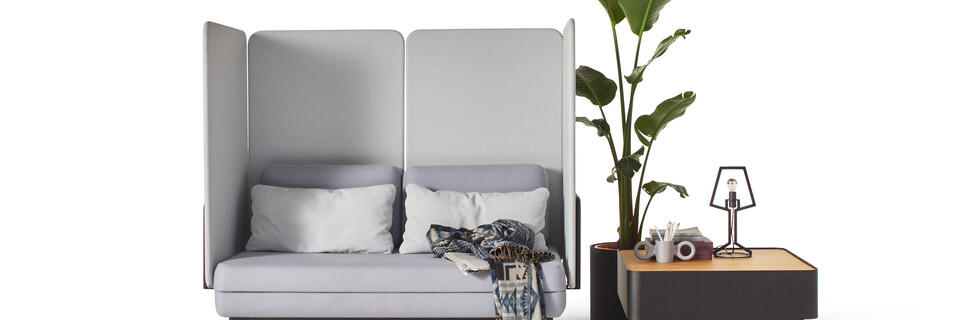 Gispen STEE sofa in black upholstered in grey and light blue with black coffee table and oak top with black Outline table lamp front view