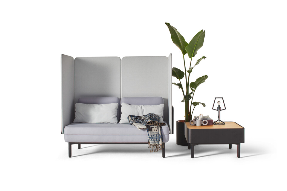 Gispen STEE sofa in black upholstered in grey and light blue with black coffee table and oak top with black Outline table lamp front view