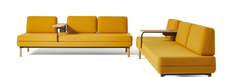 Gispen STEE sofas in black upholstered in yellow with oak tables and PuKs front and right view