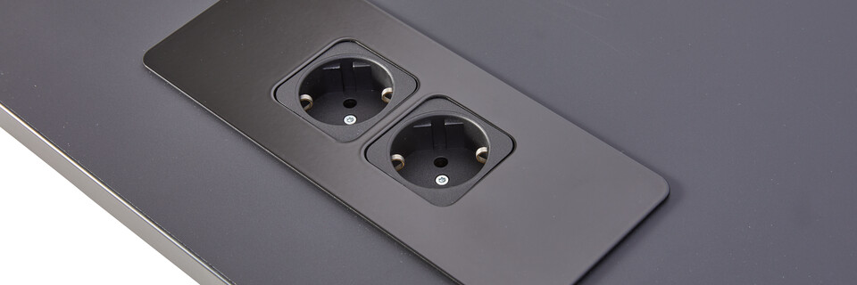 Gispen FLOO foldable table with electrification in black tabletop left rear top detail view