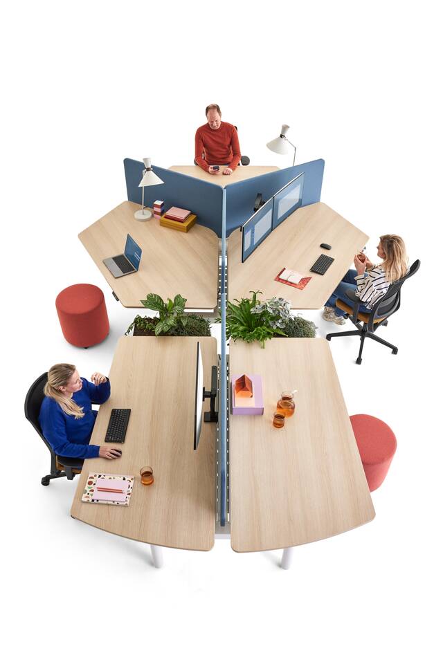 Gispen TMNL Round sit stand trio and dual workstation with oak tabletops and orange S25 screens styled with ZINN office chairs and models top right side view