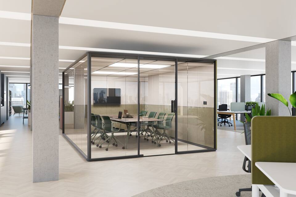 Royal Ahrend Zoniq office pod in anthracie and upholstered in green and 1200 conference table with green well chairs in office setting in office setting interior view