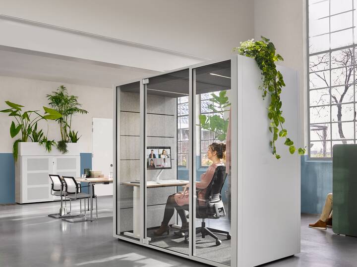 Ahrend Switch and Zinn with Qabin Chat with Ease inside and door closed with SDK with planter in a Hybrid working community setting