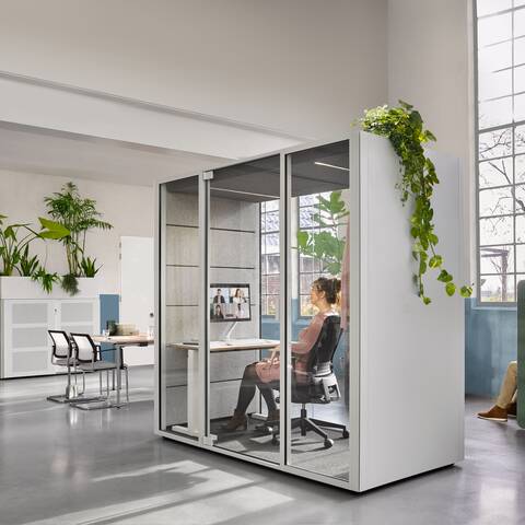 Ahrend Switch and Zinn with Qabin Chat with Ease inside and door closed with SDK with planter in a Hybrid working community setting