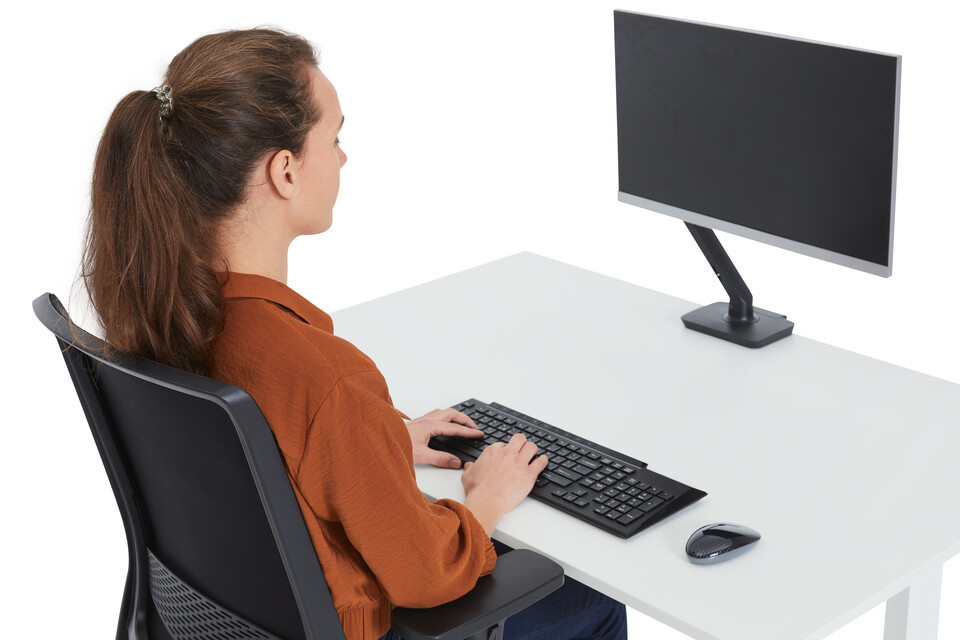 Ahrend correct ergonomic position with eye sight lined with monitor top front right detail view
