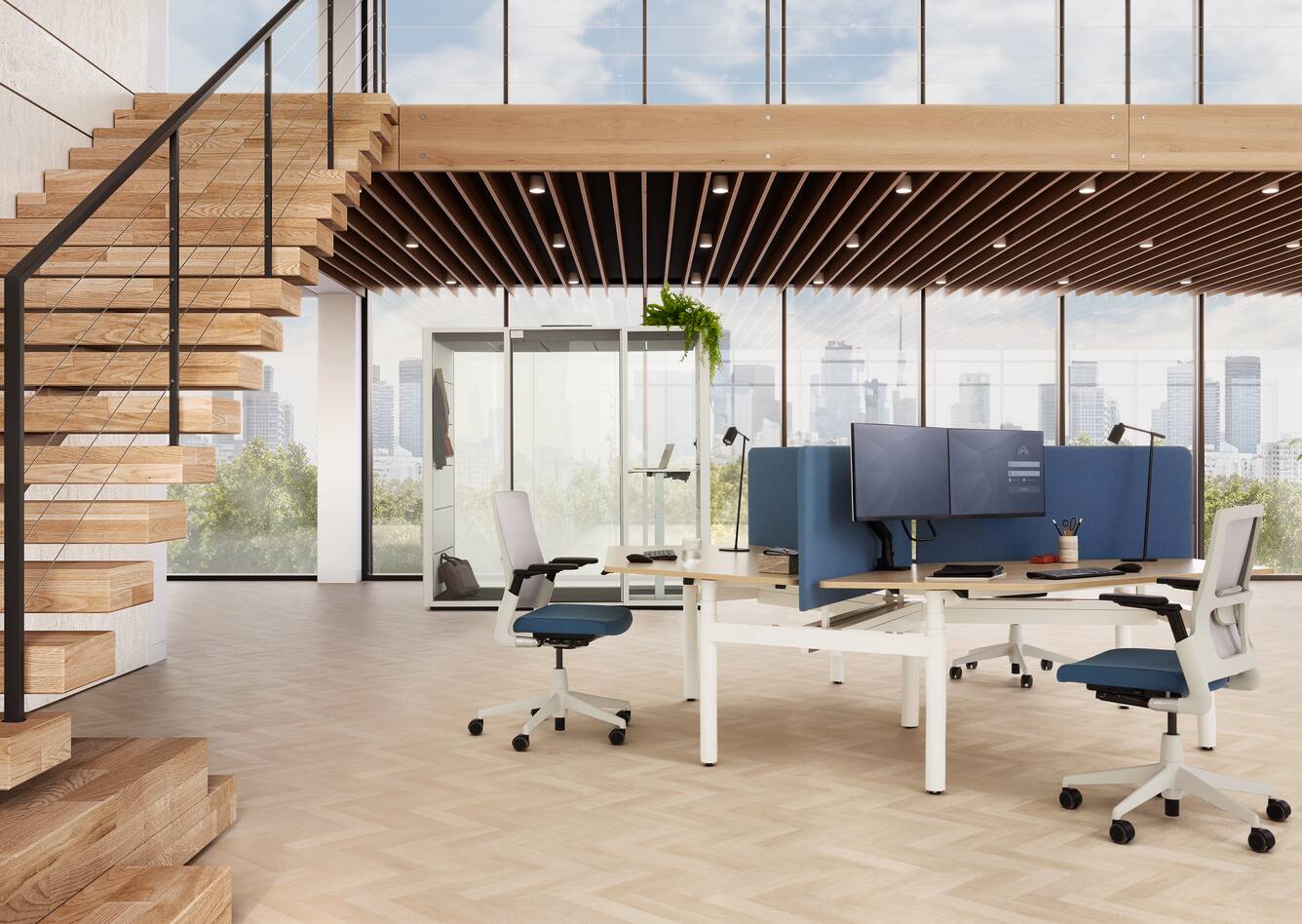 Ahrend Modea sit stand trio workstation in white with oak tabletop and blue S25 screens in a vitalising workspace interior view