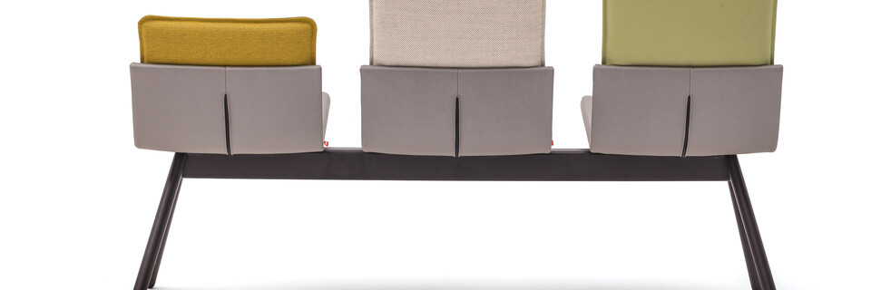 Gispen Triennial Wait chair with seats in silverguard sg94011 sterling and backs in silica 7039 10 and basel 123 and malta 7037 14 rear view