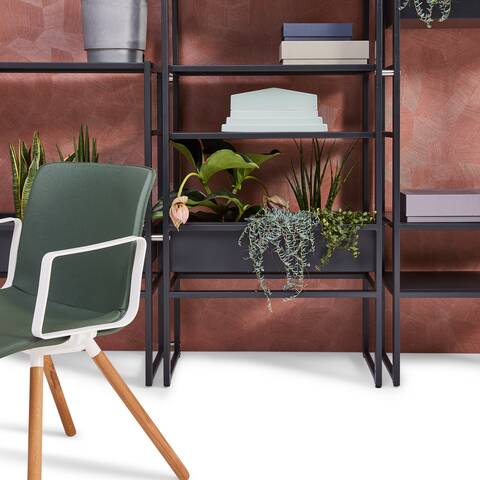 Gispen CIMO shelving unit in black with plants and white NOMI Wood with green upholstered cover in front of backpanel front view