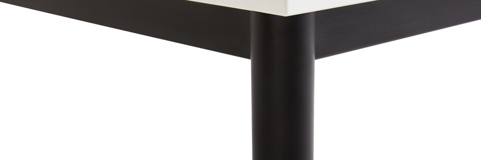 Gispen UT round 4 leg table in black with white tabletop front left detail view