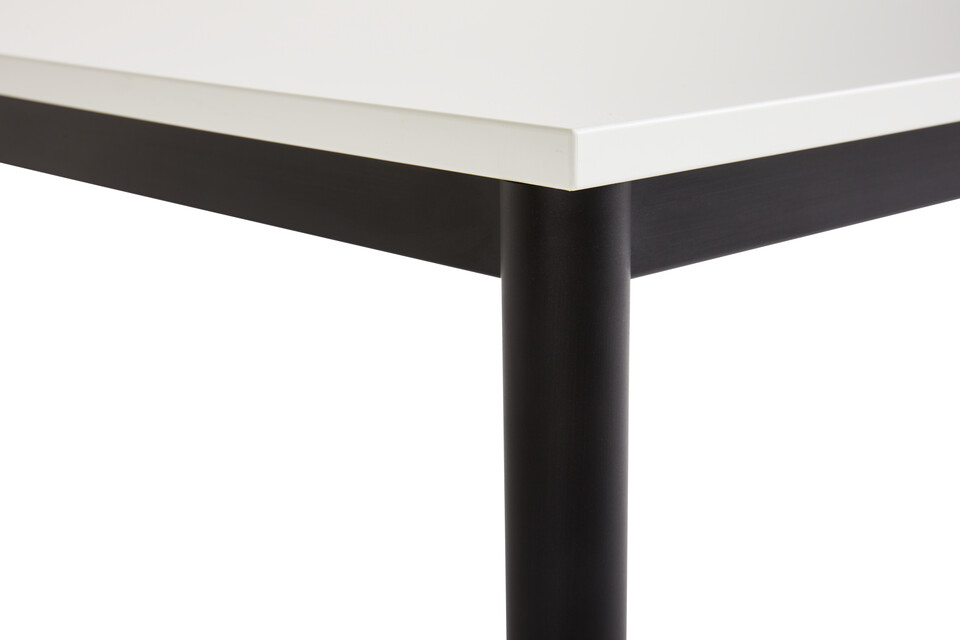 Gispen UT round 4 leg table in black with white tabletop front left detail view