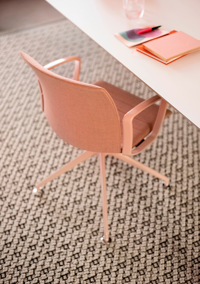 Royal Ahrend Well trestle base chair fully upholstered in pink at Kvadrat store in Amsterdam L1000591