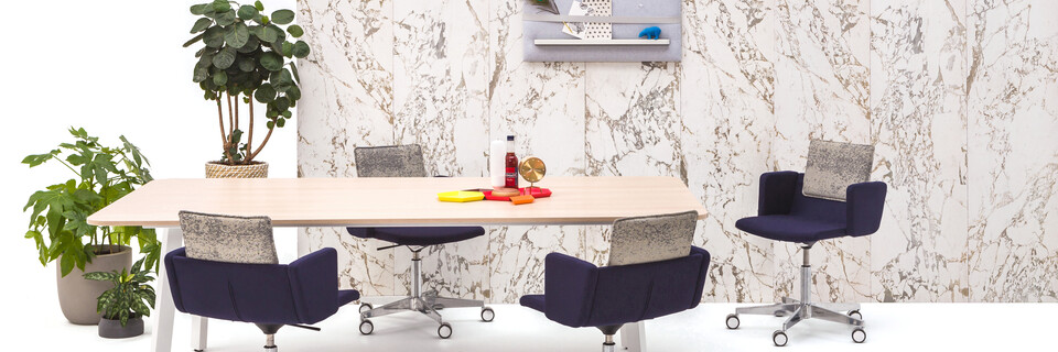 Gispen TM Conference table with Triennial Works chairs in front of marble backpanel front view