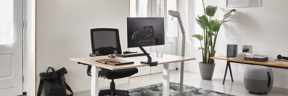 Ahrend Home HVM desk in white with oak tabletop and black A2020 Verta office chair with grey Recharge and Pyramid bench in a work from home setting