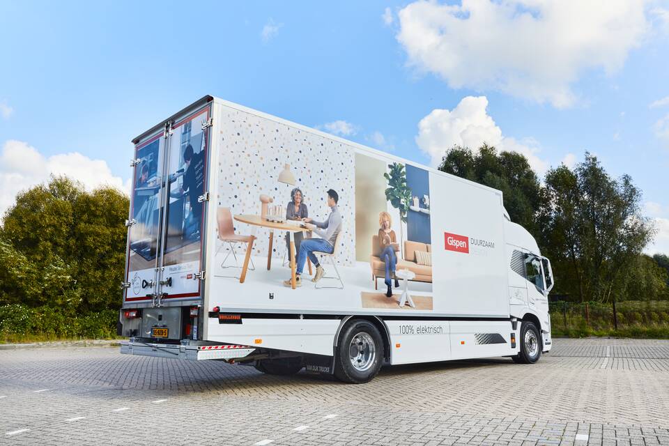 Gispen truck in white with Nomi visuals and logo with payoff left rear view