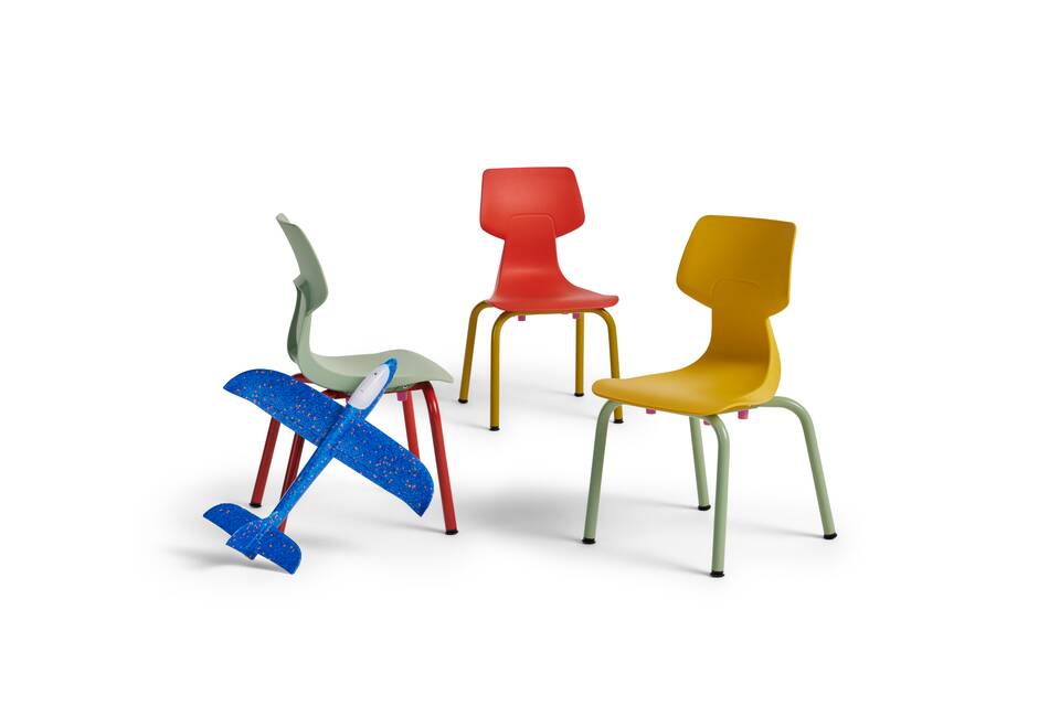 Gispen WIZZ 4 leg chairs B2 in different coloured frames and small shells with blue toy plane left side front left and front right view