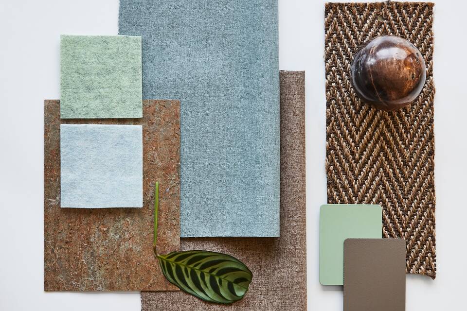 Ahrend Moodboard with brown and green samples top view