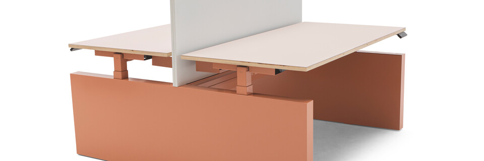 Gispen TMNL dual workstation 3 stage sit stand in pink with pink top and white screen front left view