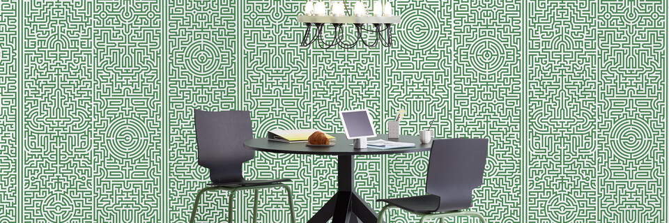 Gispen Dukdalf table with black frame and black tabletop with More or Less chair and Centraal Museum chandelier with tablet in front of green patern background front view