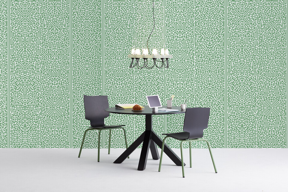 Gispen Dukdalf table with black frame and black tabletop with More or Less chair and Centraal Museum chandelier with tablet in front of green patern background front view