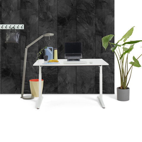 Gispen Home office HI desk in white with white tabletop with polished concrete wall and styling front view