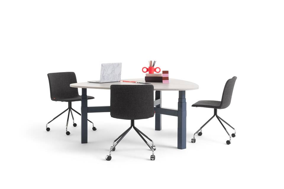 Gispen TMNL Agile 3 leg table in blue with grey beech tabletop with black NOMI work chairs upholstered in black and styling front right view