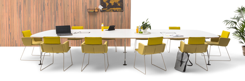 Gispen TEAM Project conference table with chrome legs and black frame with white tabletop with yellow Triennial Project chairs and scrapwood backpanel front view