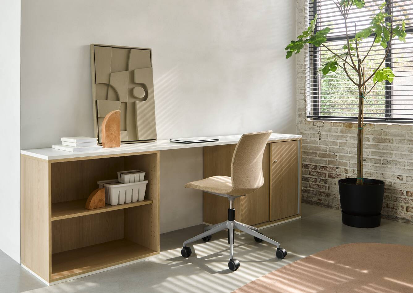 Techo Hyll open and closed cabinets with white top and beige upholstered Well chair front left view