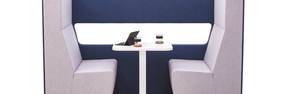 Gispen MultiLounge alcove setup with blue connecting wall and pink grey seating with white KOLM Column square table and tablet side view