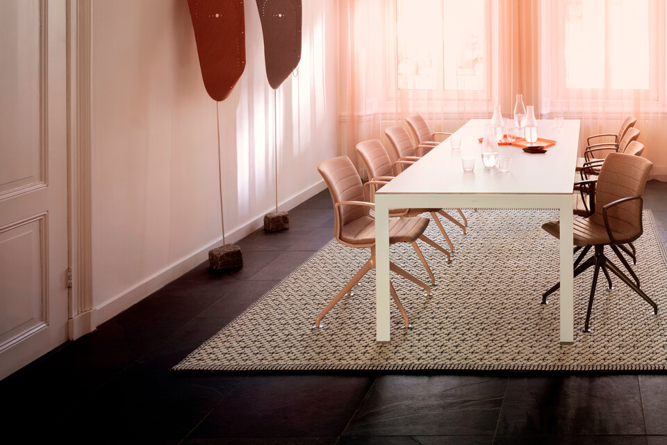 Royal Ahrend Well trestle base chairs fully upholsterered in pink and grey at Kvadrat store in Amsterdam DSF3197