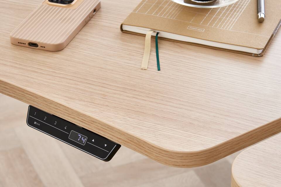 Ahrend Modea sit stand solo workstations in white and oak wave tabletops seperated with height adjustment front right detail view