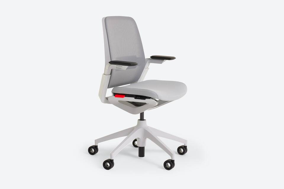Ahrend Remode office chair in grey with upholstered seat and netweave back with lumbar support and wheels in seat direction front left view