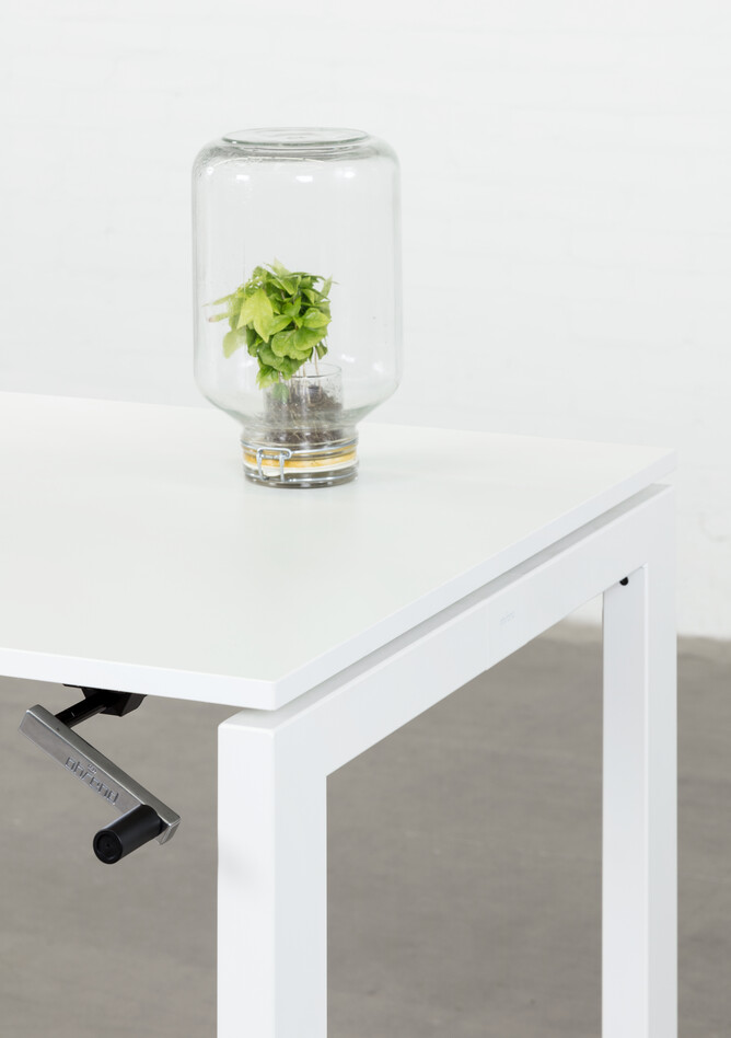 Royal Ahrend Balance 4 leg in white with crank and glass jar with plant front right detail view