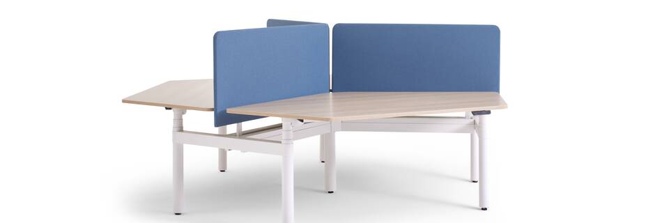 Gispen TMNL Round sit stand trio workstation in white with oak tabletop and blue S25 screens front left view