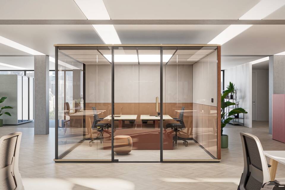 Royal Ahrend Zoniq office pod in anthracie and upholstered in orange with red Balance duo desk and black Remode office chairs in office setting front view