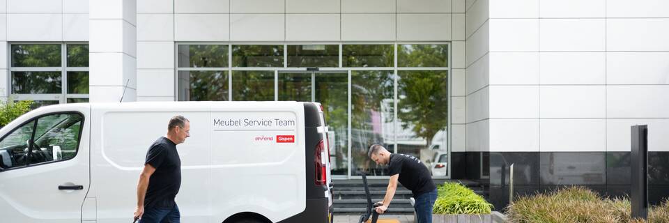 Ahrend MST mechanics arriving with dual branded van for chair replacement service SP03