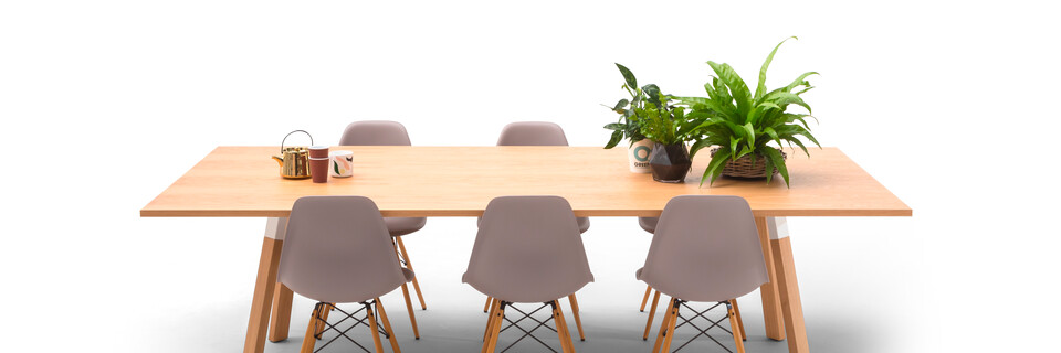 Gispen TEAM Wood rectangle conference table with diagonal oak legs and tabletop with DSW chairs and styling front view