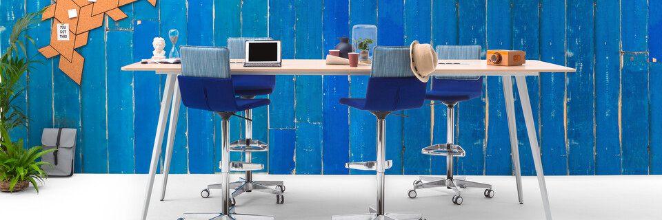 Gispen TEAM Classic narrow high conference table with grey legs and frame with birch tabletop and blue Triennial Work High chairs with blue scrapwood backpanel