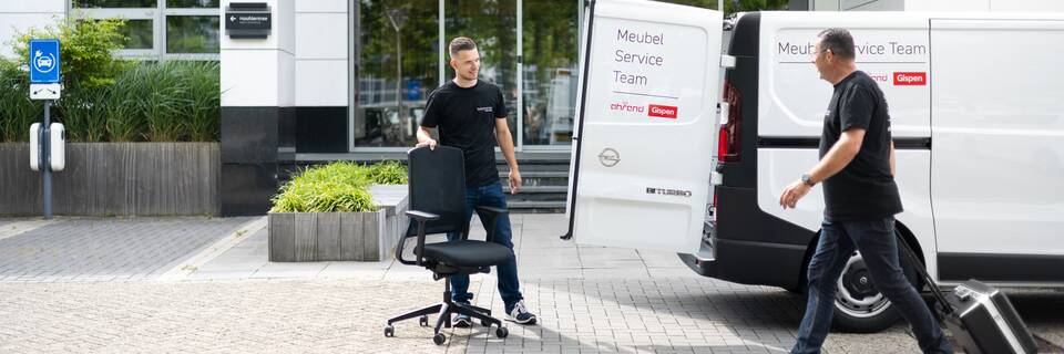 Gispen MST mechanics arriving with dual branded van for chair replacement service SP04