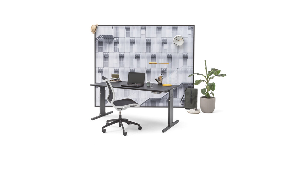 Gispen Cimo mono table with anthracite frame and mono cover low with black chipboard tabletop and Turn work chair with grey appartmentblock backpanel front right view