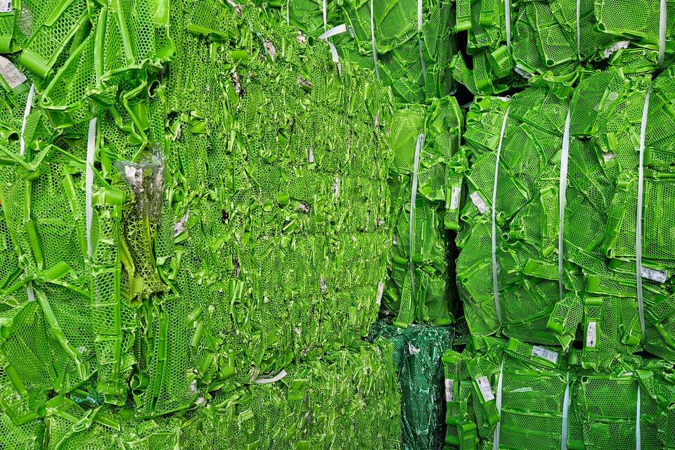 Gispen WIZZ chair materials of green plastic fruit crates in bales
