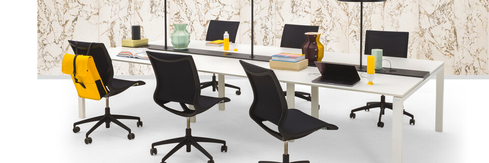 Gispen IC bench in white with black Turn chairs and Ring T1 tablelamp with marble backpanel front right view